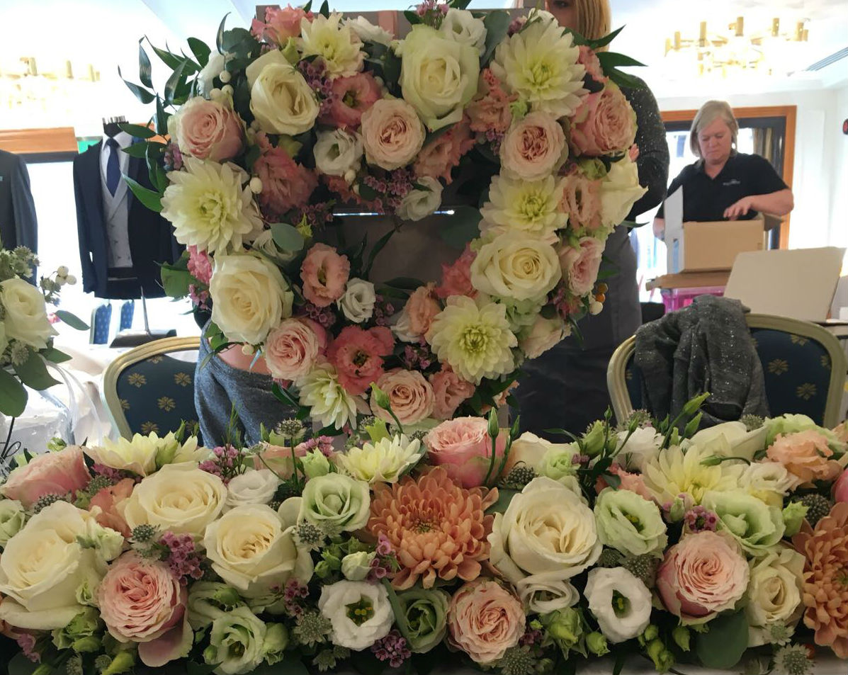 Top table designs, wedding flowers, martini table centrepiece
