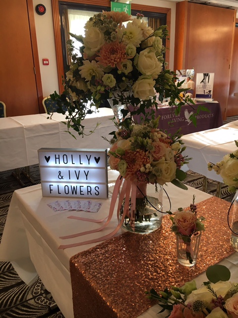 Top table designs, wedding flowers, martini table centrepiece