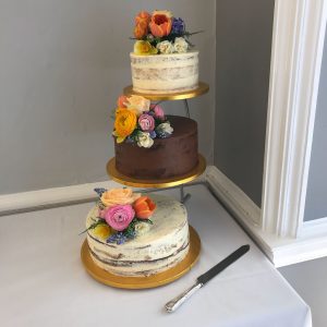wedding cake with fresh flowers