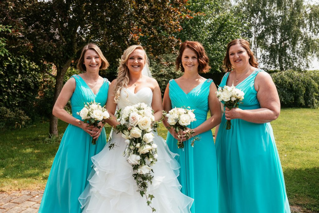 bridal party with bouquets