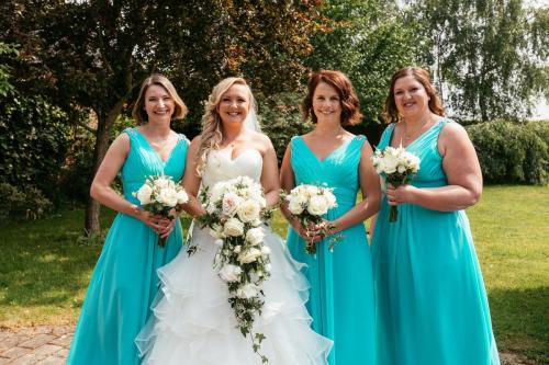 bridal party with bouquets